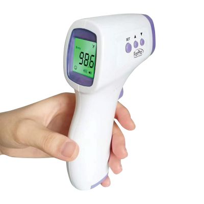 hand holding a digital thermometer that reads 98.6 degrees fahrenheit 